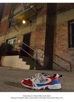 A Tennis Shoe in the Street海报封面图